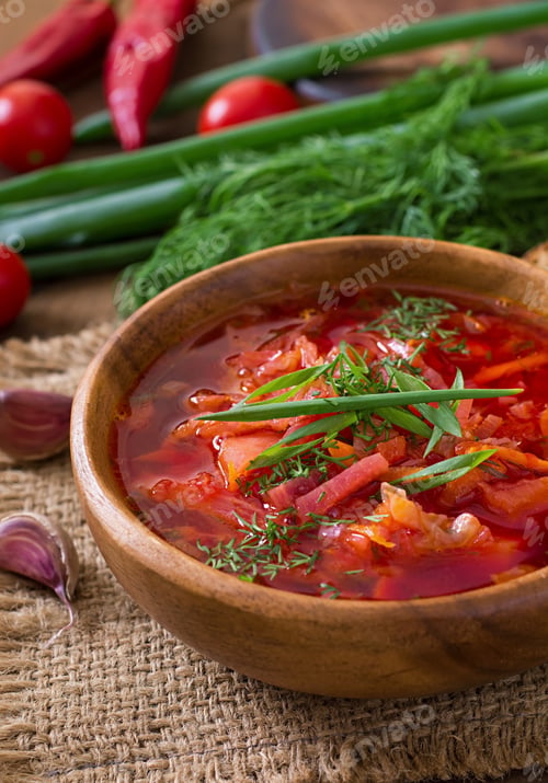 Preview: Traditional Ukrainian Russian vegetable borscht on the old wooden background