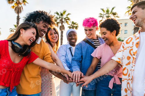 Preview: Multiethnic group of young happy friends hanging out
