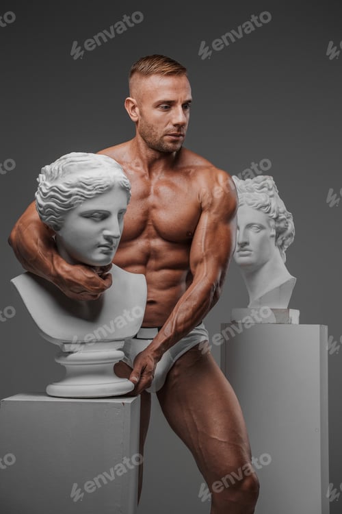 Preview: A muscular masculine man wearing only underwear