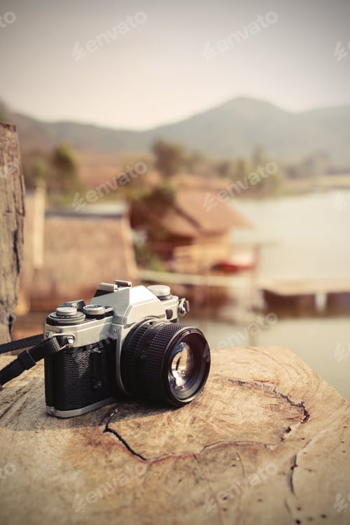 Preview: Vintage camera with view of lake and mountain