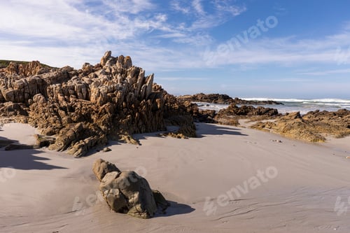 Preview: View over a sandy beach and rock formations on the Atlantic coastline.