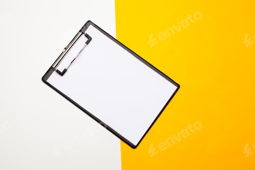 Preview: Blank clipboard paper on bright yellow background