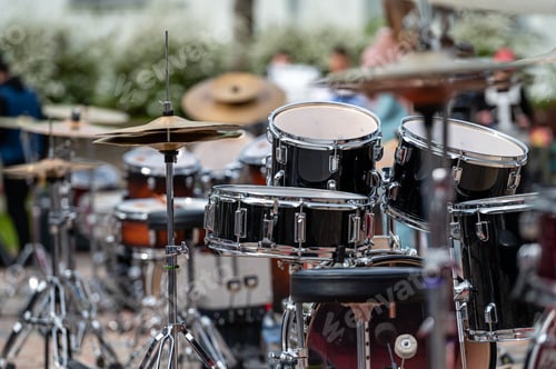 Preview: A set of plates in a drum set. At a concert of percussion music, selective focus, closeup