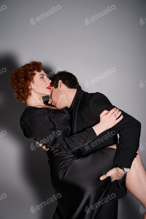 Preview: handsome man holding his beautiful girlfriend tight and ready to kiss passionately, sexy couple