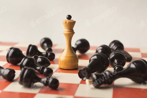 Preview: White chess queen beats blacks on chessboard