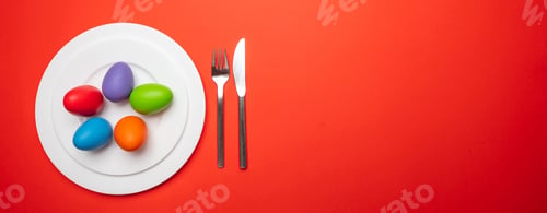 Preview: Easter eggs, pastel colors painted in a white plate, orange color background, banner