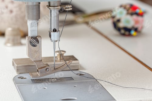 Preview: Sewing machine needle with thread and fabric