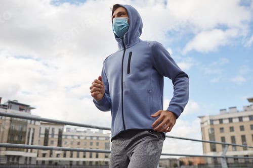Preview: Man jogging outdoors