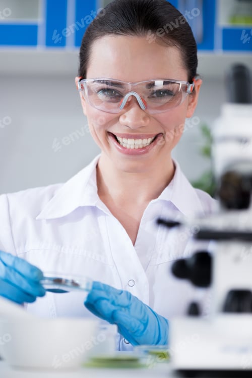 Preview: Female scientist during work at modern biological laboratory