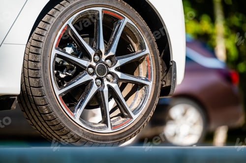 Preview: sports car wheels, low profile tires on aluminum rims, closeup