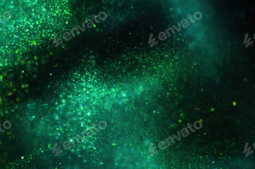 Preview: Abstract green background with tints of gold sparkles.