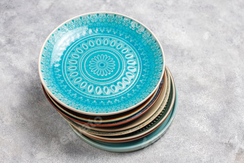 Preview: Different ceramic empty plates and bowls.