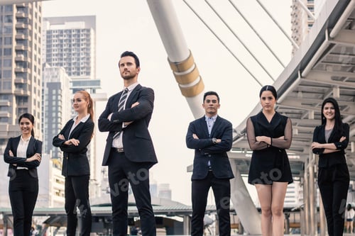 Preview: businesspeople team of multi ethnic standing with confidence in full suit