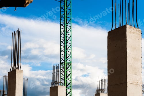 Preview: Construction of a new residential building, with the concrete columns shuttering in sight.