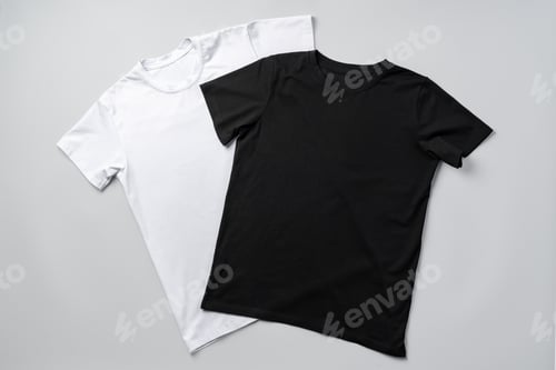 Preview: Cotton T-shirt on gray background flat lay top view