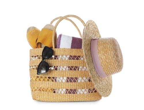 Preview: Bag with beach accessories on white background
