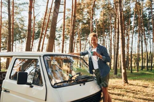 Preview: Man is traveling alone in the forest at daytime at summer
