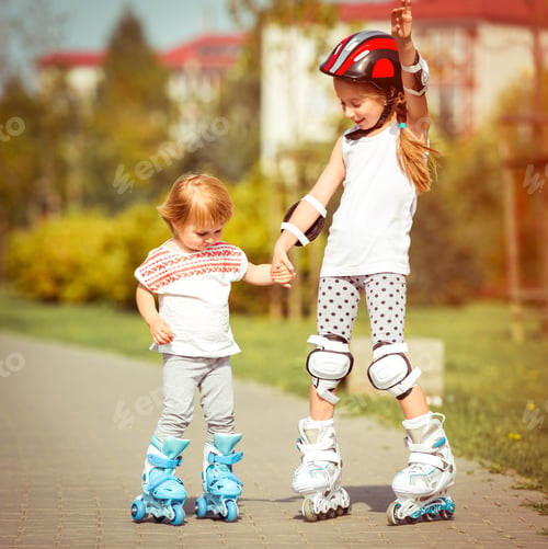 Preview: two little sisters in a roller skates