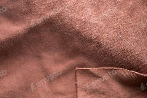 Preview: Close-up of Brown Fabric with Stitching