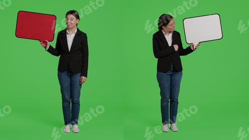 Preview: Businesswoman showing speech bubble to create ad in studio