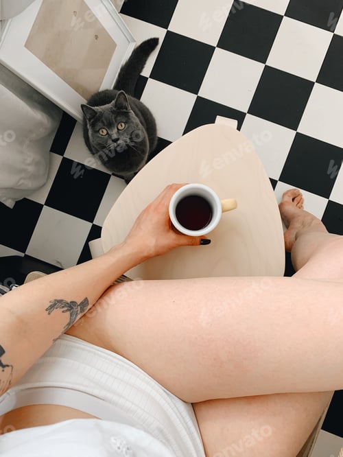 Preview: Woman Relaxing At Home with Cat and Coffee