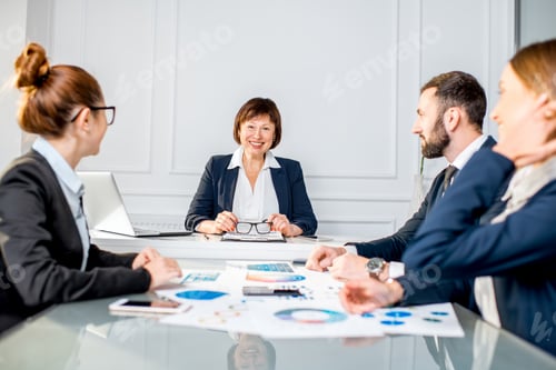 Preview: Business people during the conference in the office