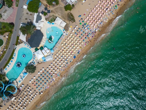 Preview: aerial view of Bulgaria's Golden Sands resort during the summer season: an array of hotels, pools