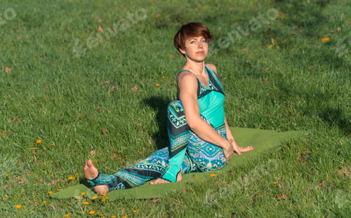 Preview: Yoga. The Girl In The Park Is Practicing Yoga