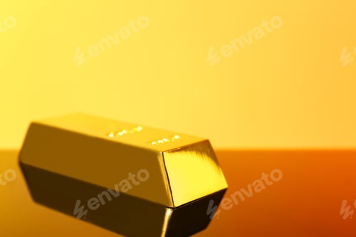 Preview: Precious shiny gold bar on mirror surface, space for text