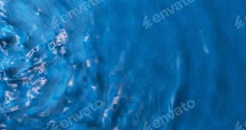 Preview: Waves propagate through the water on a blue background