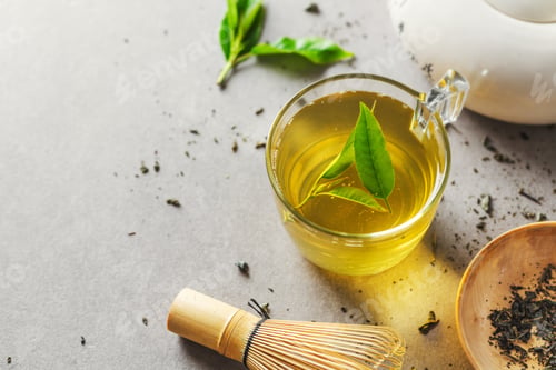 Preview: Green tea brewed in cup on table