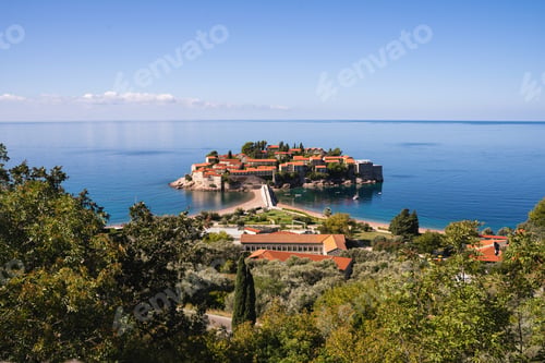 Preview: Panoramic photo of a village built in a piece of land that juts out into the sea