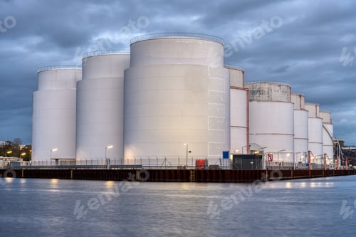Preview: Storage tanks for fossil fuels at dusk