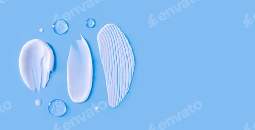 Preview: cosmetic smears cream texture on blue background