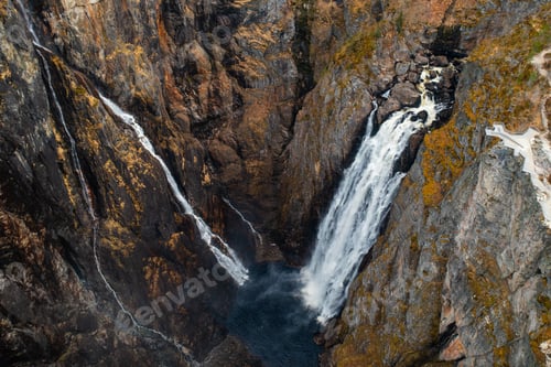 Preview: Voringsfossen waterfall with water plunges into deep dark pool