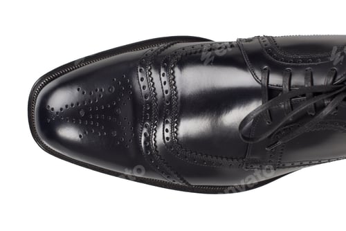 Preview: Men single black shoe isolated. On a white, top view.