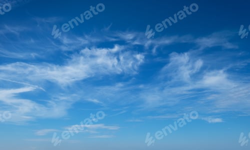 Preview: Clear Blue Sky with Wispy Clouds on a Sunny Day