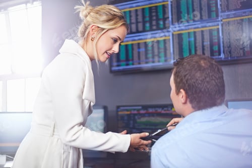Preview: Side view of young business woman in office having discussion with colleague
