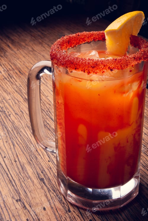 Preview: Vertical shot of alcoholic beverage on a wooden table