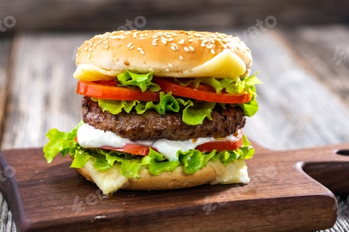 Preview: hamburger on a wooden background