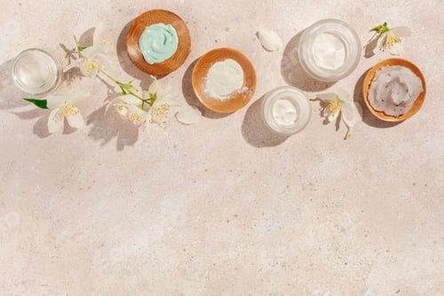 Preview: skincare products and jasmine flowers. natural cosmetics for home spa treatment