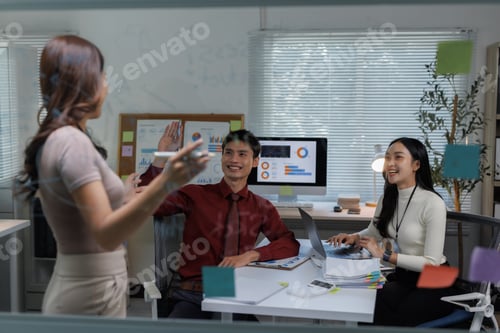 Preview: Business team collaborating during office presentation meeting