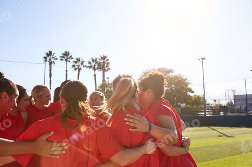 Preview: Womens Football Team In Huddle Having Motivational Pep Talk Before Soccer Match