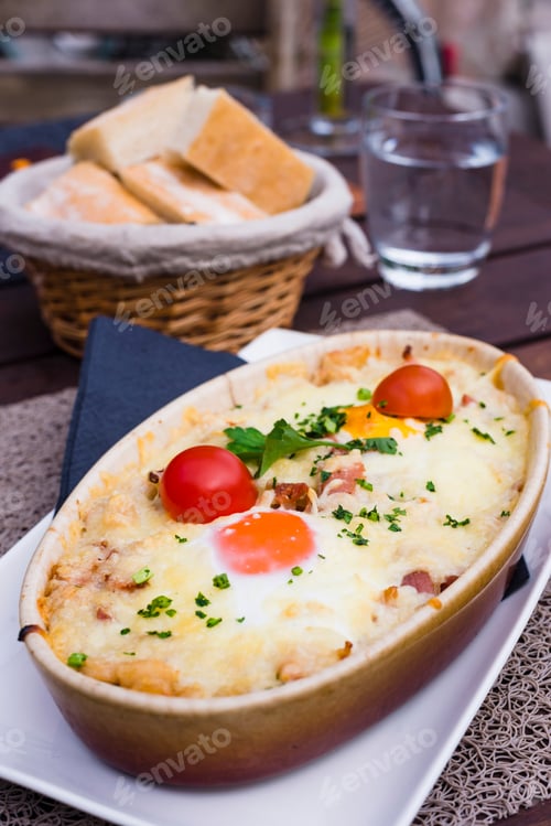 Preview: Ljubljana cafe culture. Cheese bake in one of the many cafes on the waterfront, Slovenia, Europe