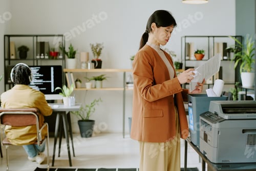 Preview: Young Woman Crumpling Bad Copy Of Document