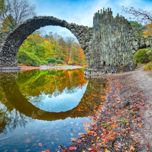 Preview: Breathtaking autumn landscape in Kromlau Rhododendron Park . Rakotz Bridge