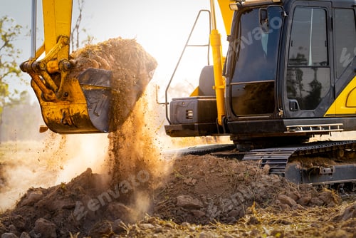 Preview: Close-up of excavator at construction site. Backhoe digging soil for earthwork and construction