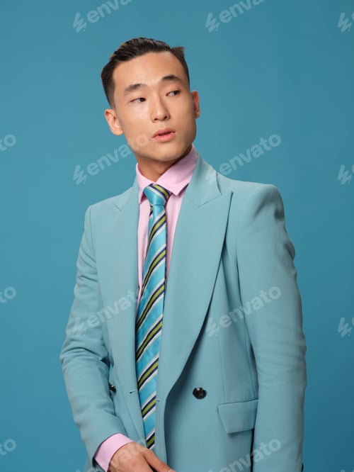 Preview: Male Asian appearance Studio self-confidence blue background