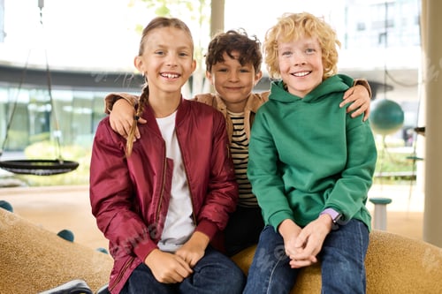 Preview: Joyful moments of childhood during a vibrant autumn day in a playful setting