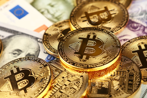 Preview: Gold bitcoin physical coins on paper currency